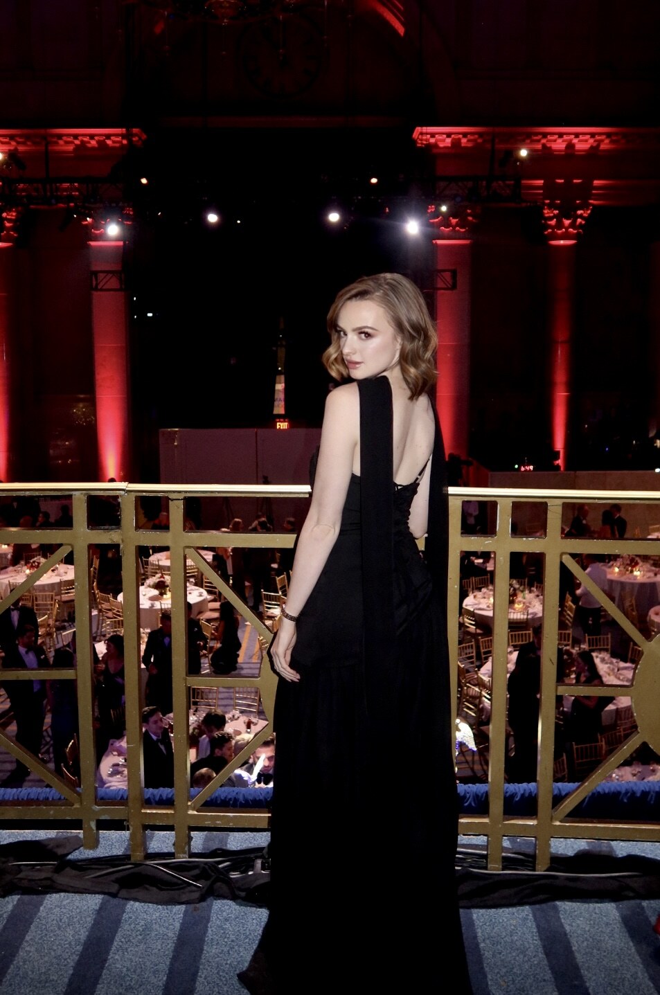 Profile portrait of Madison Campbell wearing a black evening gown
