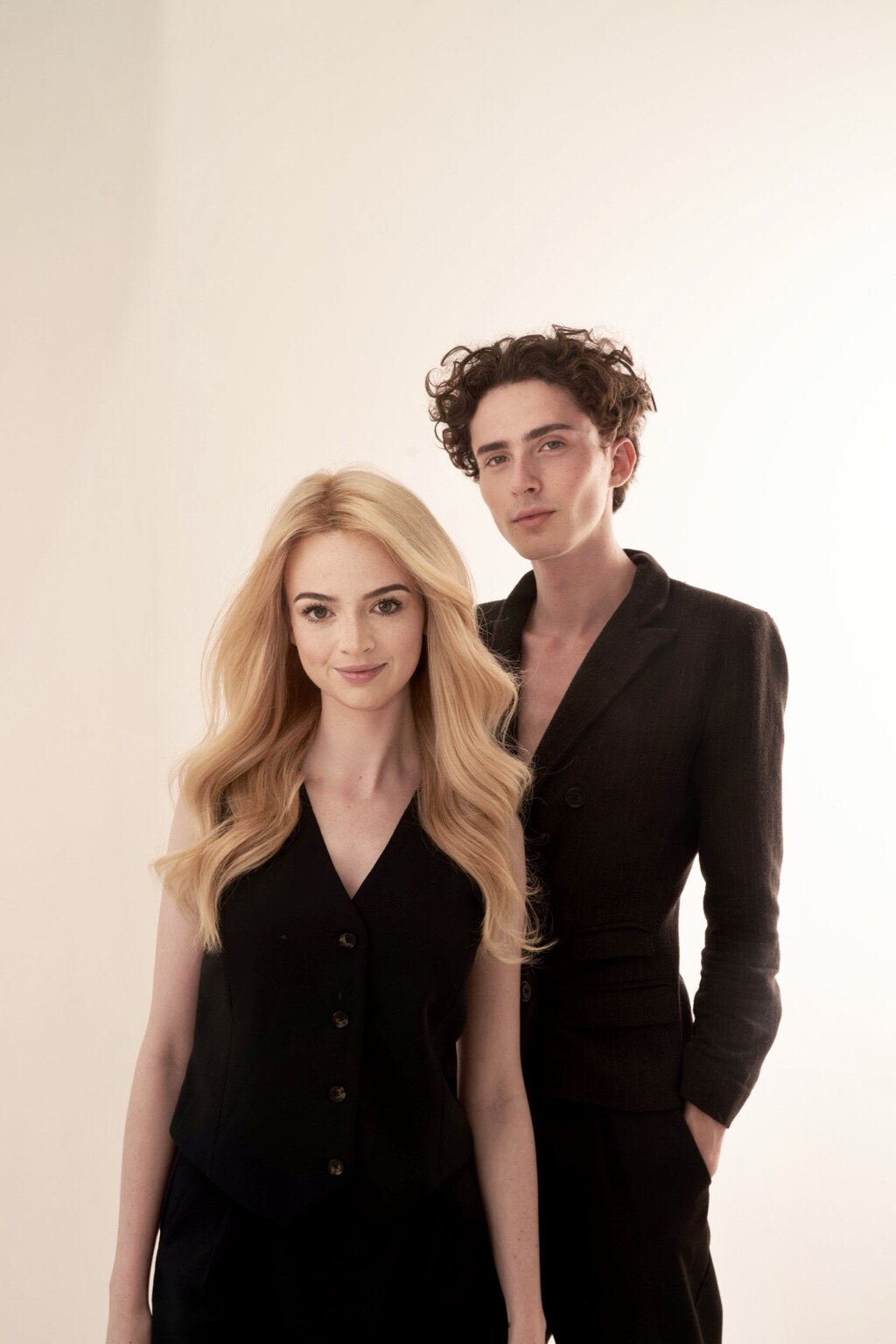 Madison Campbell and a guest facing the camera in a studio portrait